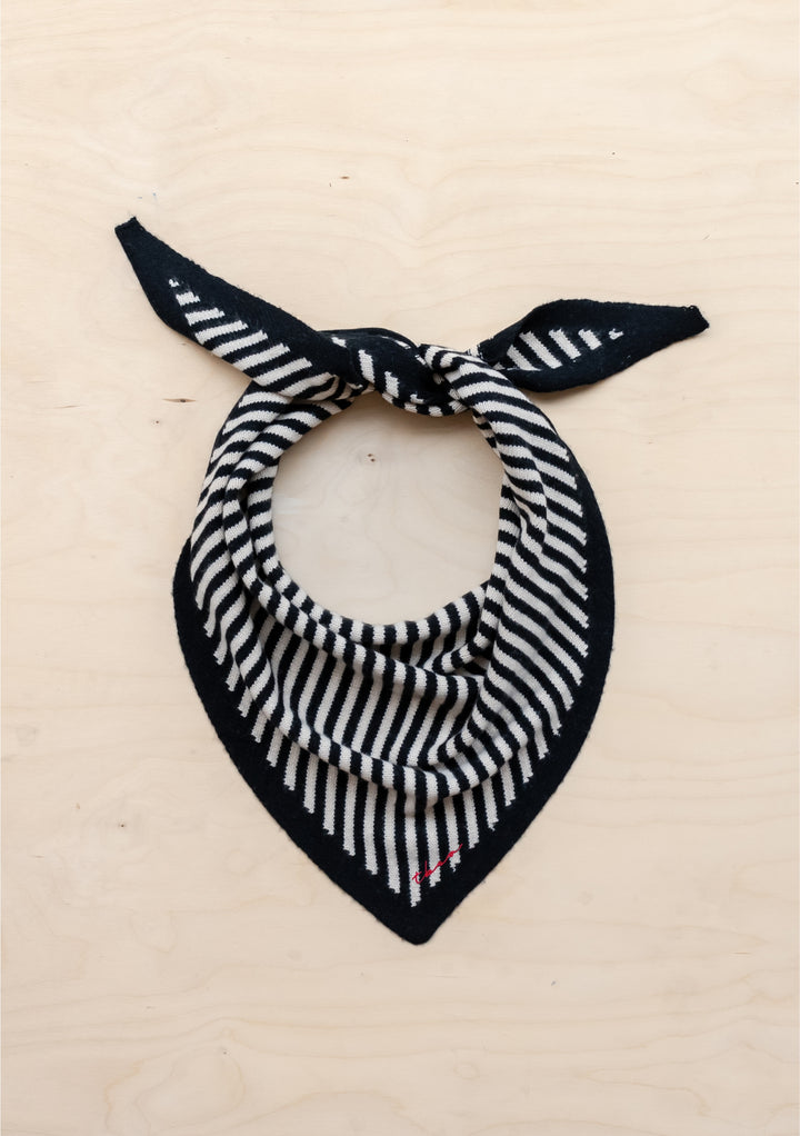TBCo Merino Triangle Scarf in Black Stripe with classic black and cream stripes and red embroidered logo on soft merino wool.