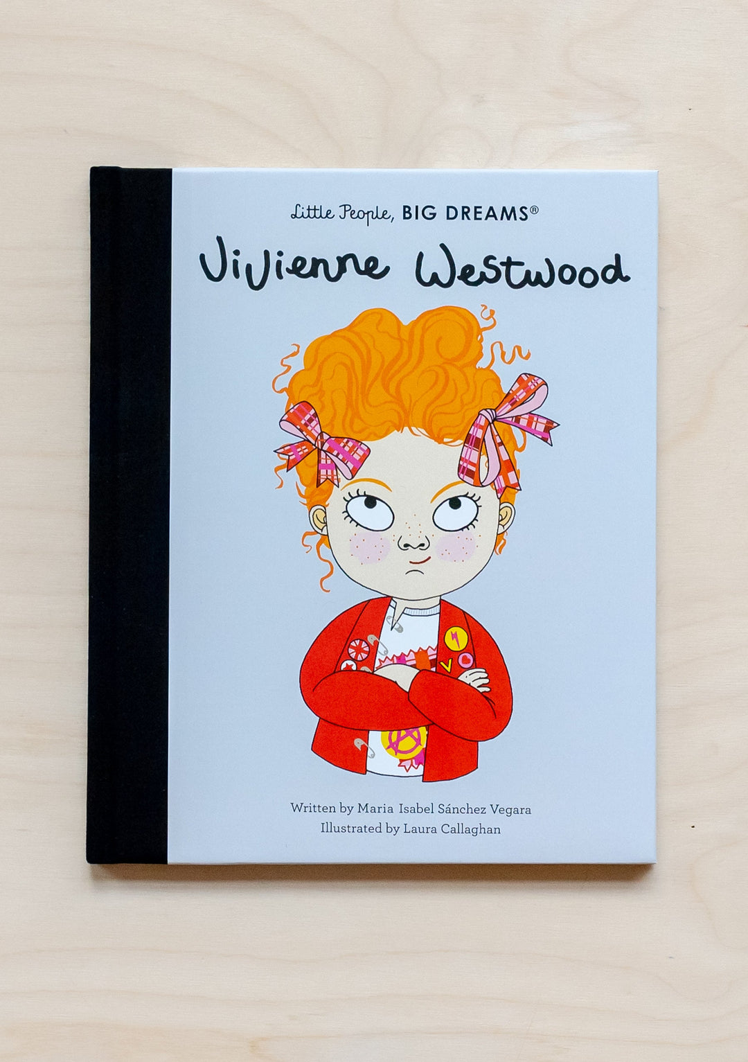 TBCo Little People Big Dreams: Vivienne Westwood childrens book cover showing illustration in red jacket with orange hair