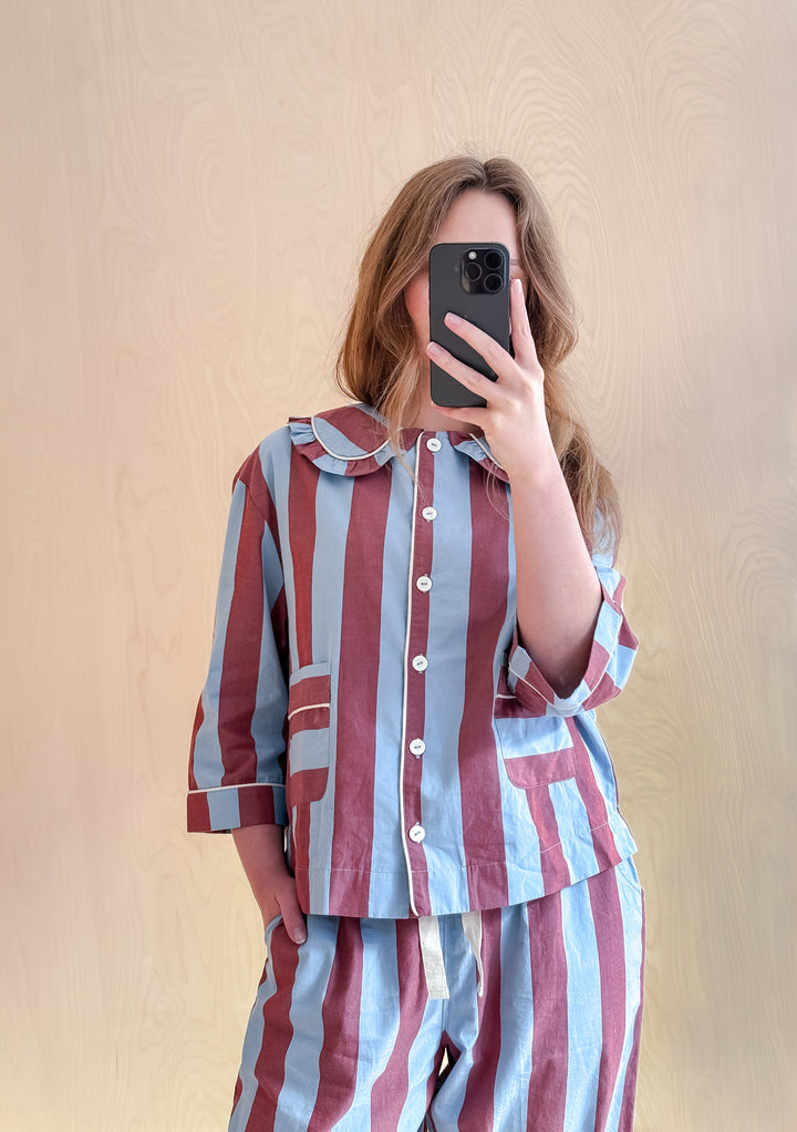 TBCo Cotton Pyjamas in blue and burgundy stripes with ruffled collar and cropped sleeves, shown in mirror selfie