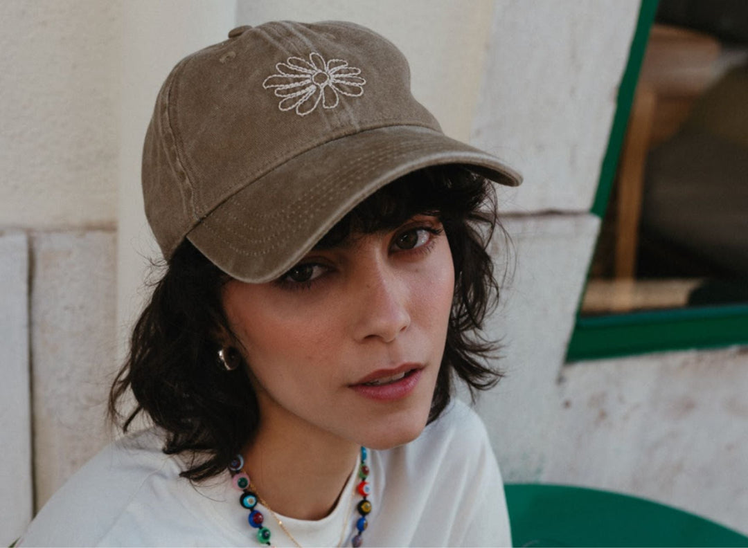 TBCo Accessories - Model wearing merino wool beanie hat and fingerless gloves in green speck