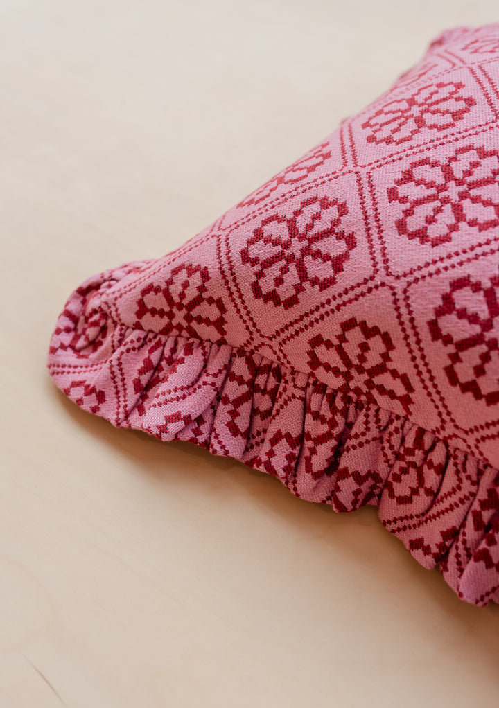 Close-up of the ruffled edge on TBCo’s Cotton Cushion Cover in Pink Floral, gallery position 3, portrait orientation.