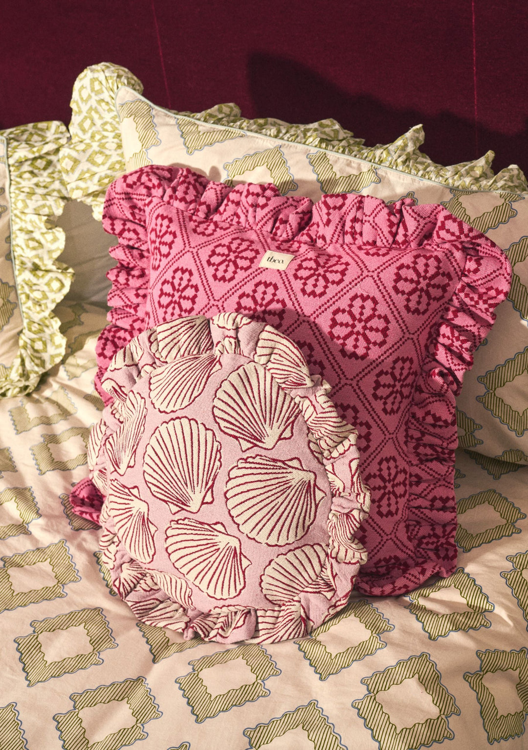 Portrait image of TBCo Mix & Match Cushion Set with ruffled pink and patterned covers in gallery position 1