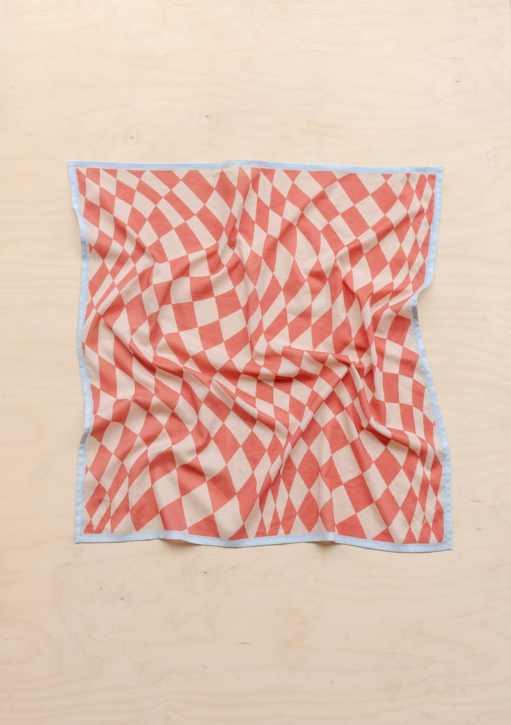Sample Sale Cotton Square Scarf in Apricot Checkerboard by TBCo, gallery position 2, laid flat with soft creases, portrait orientation