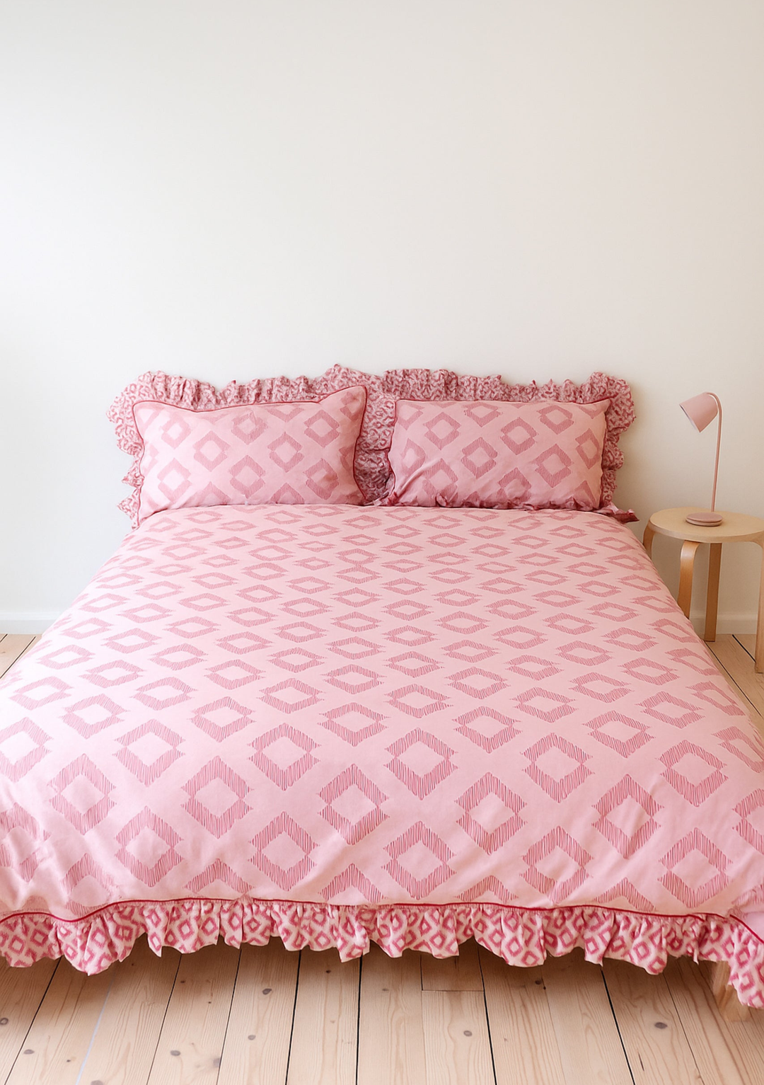 TBCo Cotton Duvet Cover & Pillowcases Set in Pink Diamond with ruffled trim and subtle pink geometric pattern on soft cotton fabric
