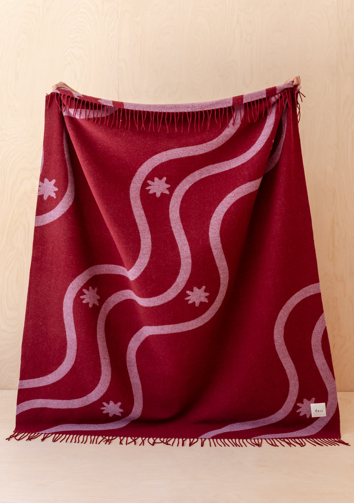 Couverture en laine d'agneau en jacquard à vagues rouges