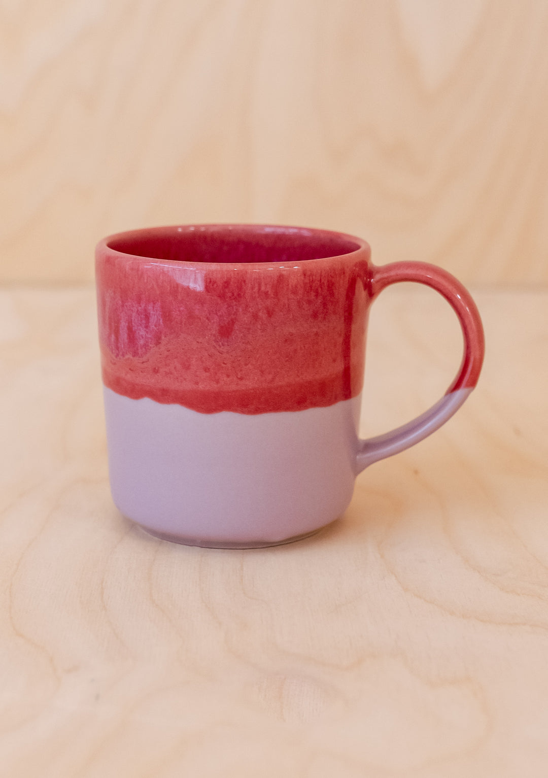 Lilac Dip Hand-Painted Mug by TBCo showing soft lilac base with warm red hand-painted glaze and rounded handle detail