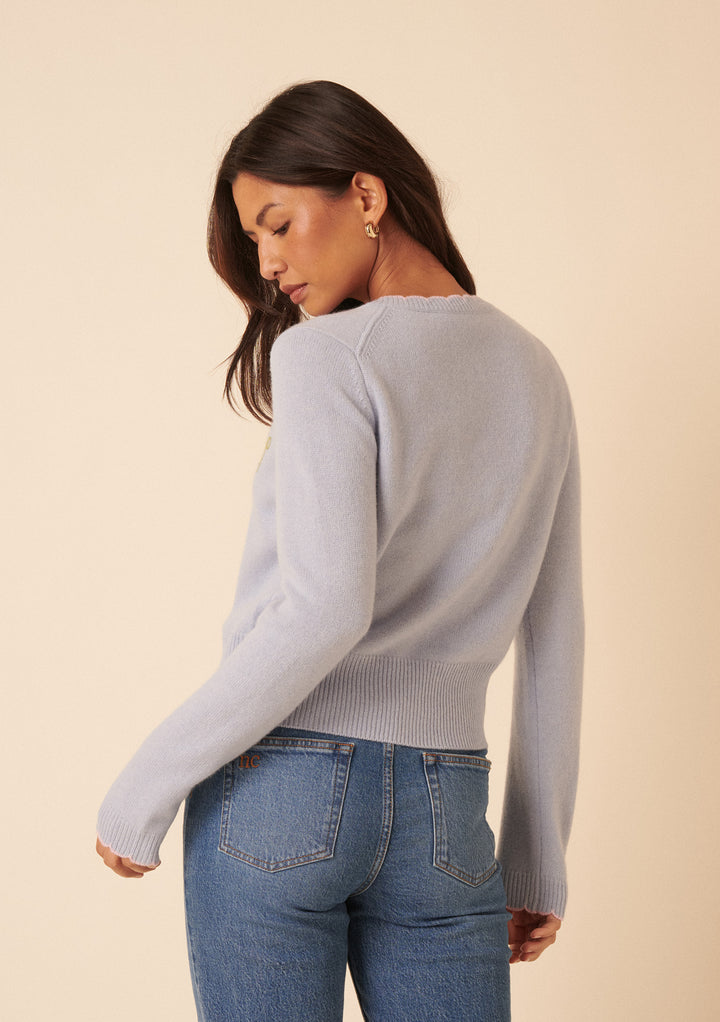 NC x TBCo – Blaue Wollstrickjacke mit Blumenmuster