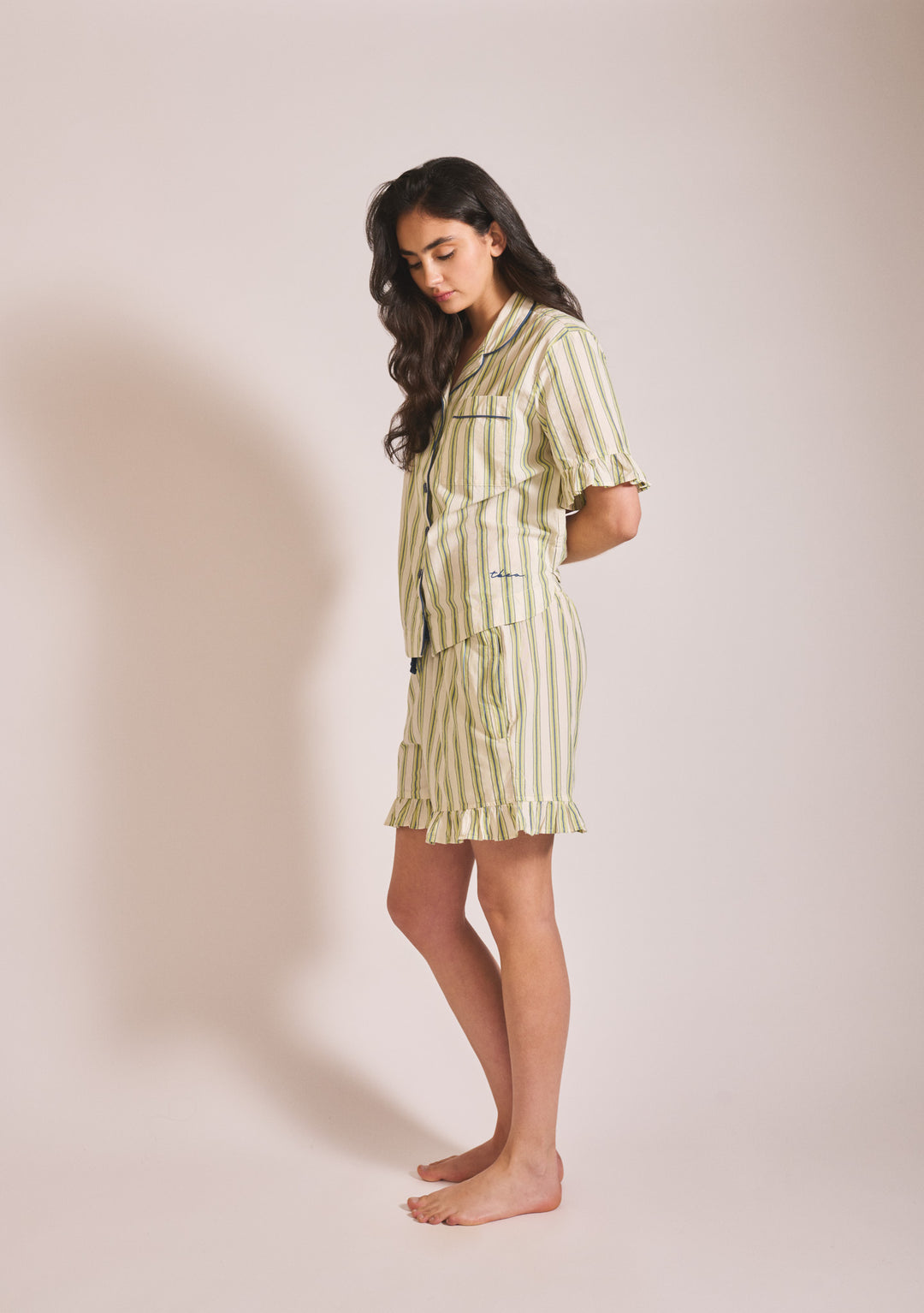 Model wearing TBCo Cotton Pyjamas in Olive Stripe Ruffle, gallery position 3, portrait 1442x2048, soft relaxed fit