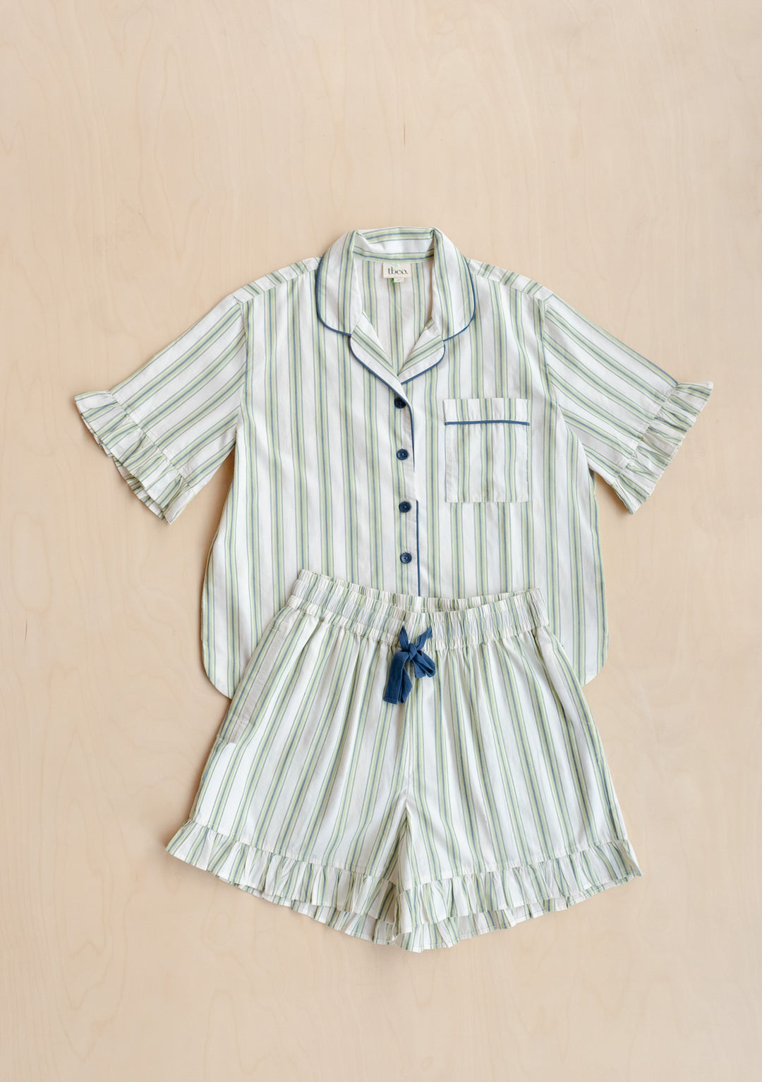 Cotton Pyjamas in Olive Stripe Ruffle by TBCo laid flat in portrait, gallery position 8, showing breathable cotton shorts set