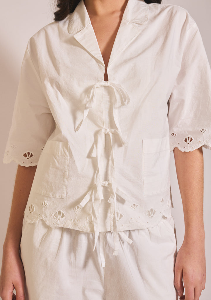 TBCo Cropped Cotton Pyjamas in White Shell featuring tie-front top with eyelet detailing and relaxed fit trousers