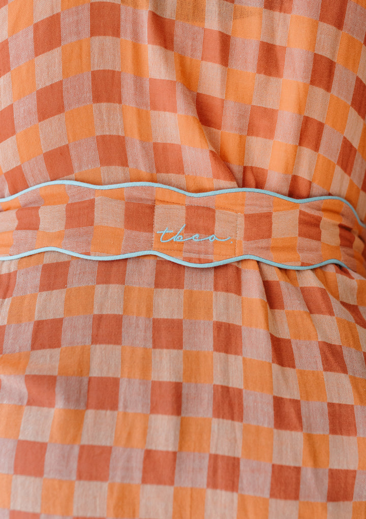 TBCo Cotton Robe featuring apricot checkerboard pattern with scalloped trim and embroidered waist belt detail