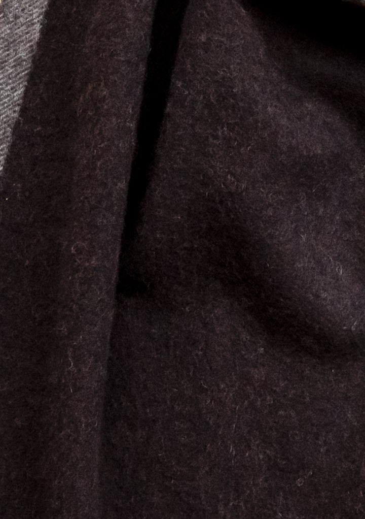 Close-up detail of TBCo's Cashmere & Merino Scarf in Brown Contrast Edge showing luxurious wool texture and weave pattern