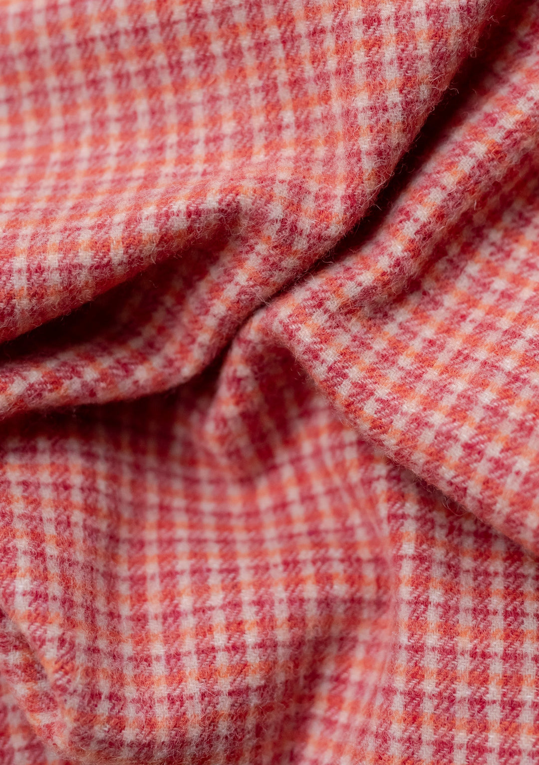 Close-up of soft woven texture on TBCo Sample Sale Lambswool Blanket Scarf in Berry Textured Check pattern