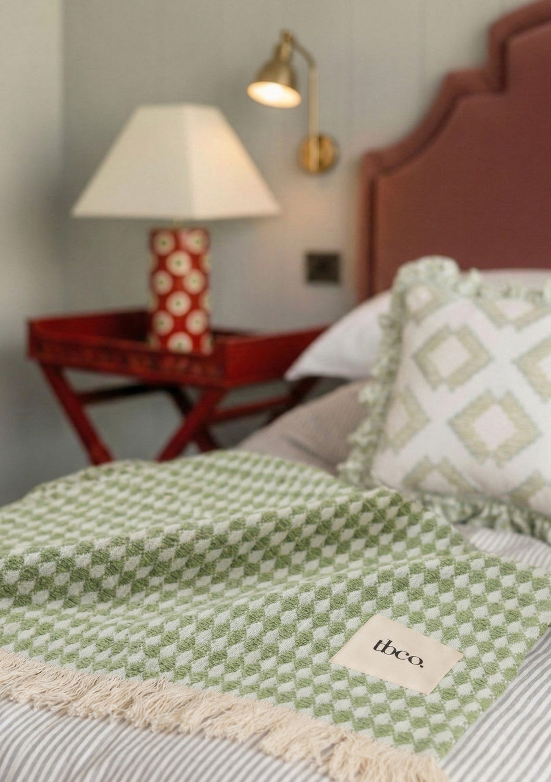 Cotton Throw in Green Argyle by TBCo with woven jacquard texture, natural and recycled fibres, Certified B-Corp, Women-Founded, designed to make an impact