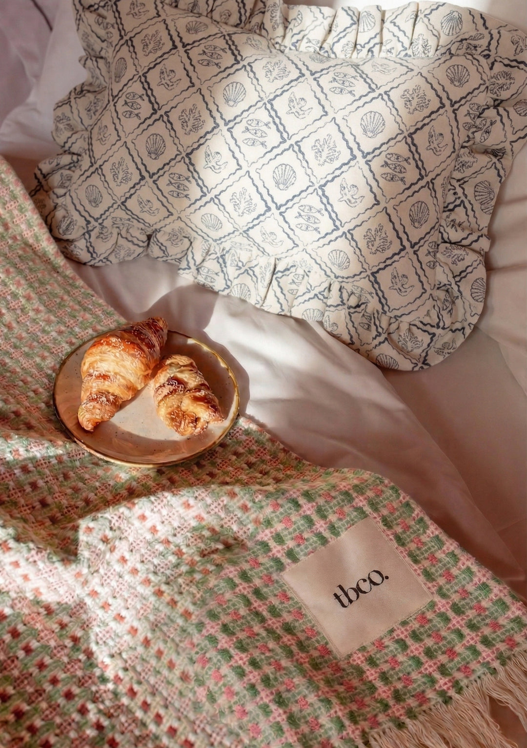 Cotton Throw in Rose Geometric by TBCo with woven jacquard texture, natural and recycled fibres, Certified B-Corp, women-founded, designed to make an impact