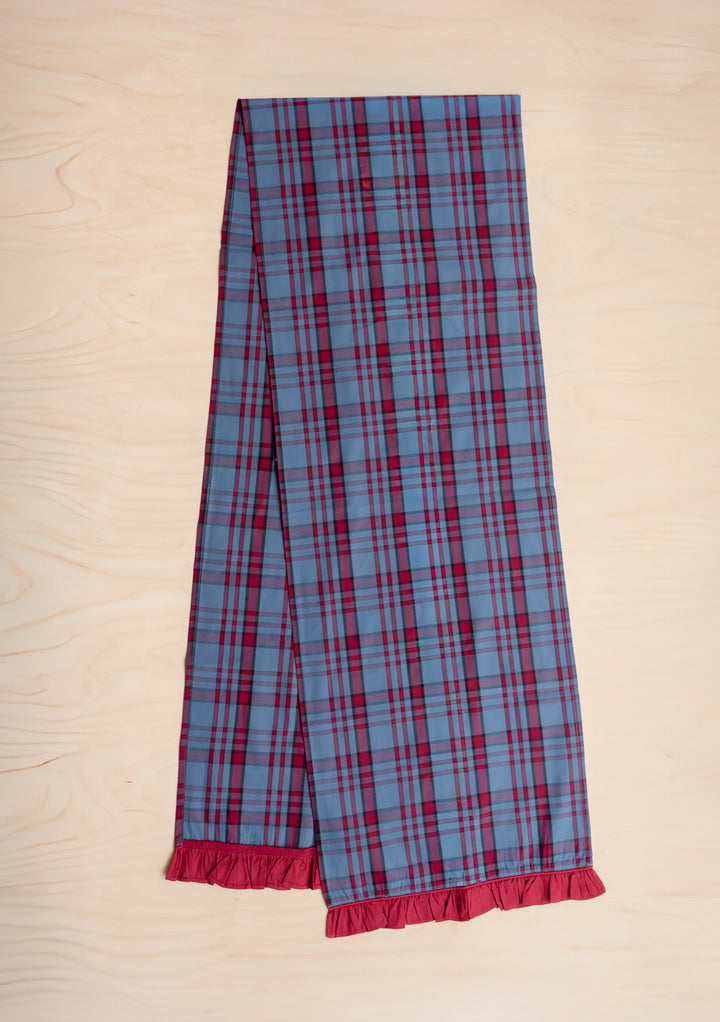 TBCo Cotton Runner in Navy Tartan with red piping and ruffled edge, crafted from sustainable cotton for festive tablescapes